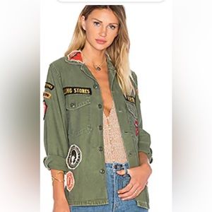 Madeworn Rolling Stones tongue vintage military jacket.